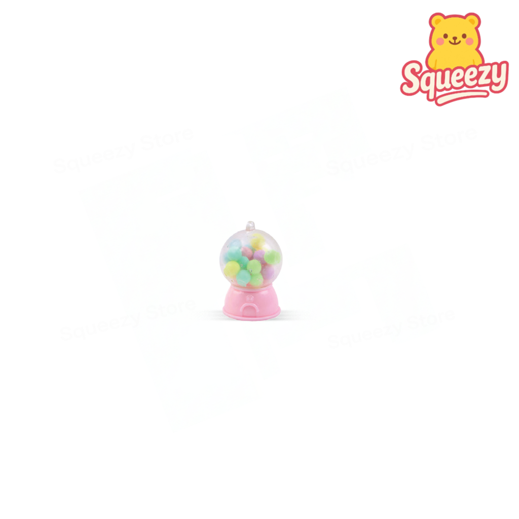 Pink Squishy Capsule Machine stress relief toy shaped like a miniature gumball machine.