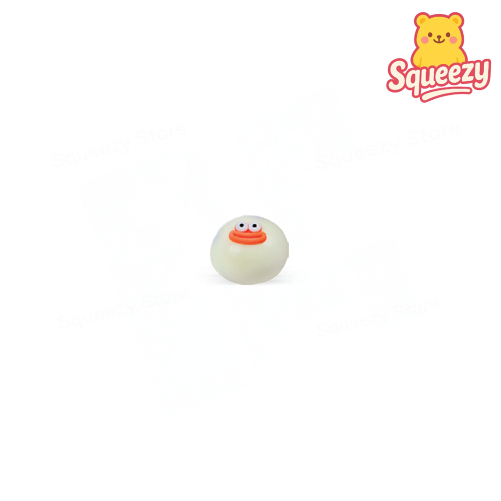 White Eva Naughty Ball squeezable stress relief toy with an orange smiling face.