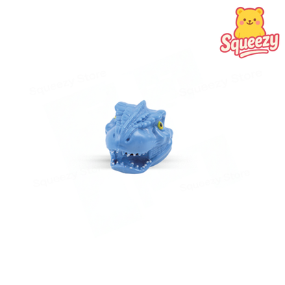 Blue Squishy Dino Head with Beads soft sensory toy with colorful beads and T-Rex design.