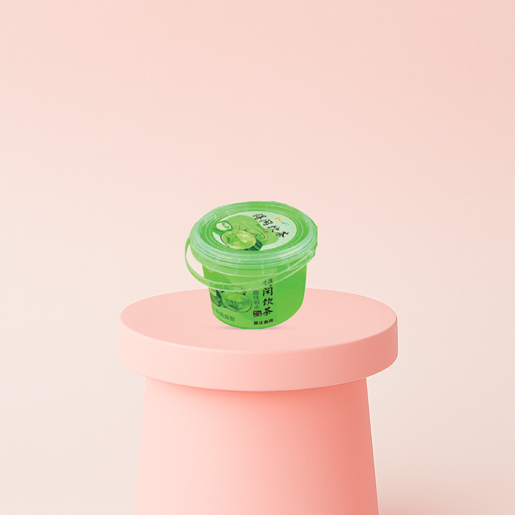Bubble Tea Putty in a green bubble tea cup container with matcha-themed design.
