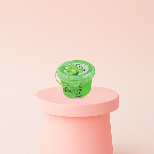 Bubble Tea Putty in a green bubble tea cup container with matcha-themed design.