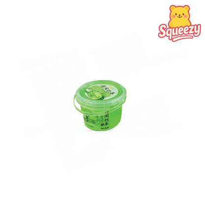 Bubble Tea Putty soft and stretchy slime packaged in a cute green matcha bubble tea cup container.