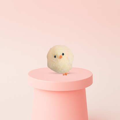 Chick Squishy displayed on a pastel stand, ultra-soft slow-rising sensory toy for stress relief.