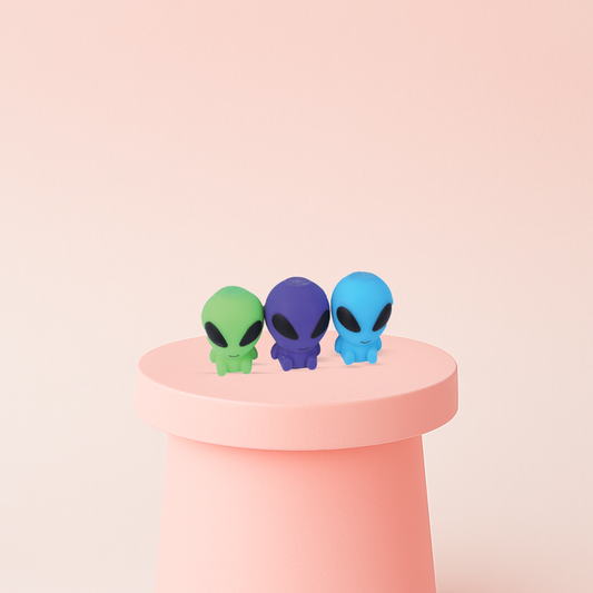 EVA Alien soft EVA stress relief toy in green, purple, and blue alien designs.