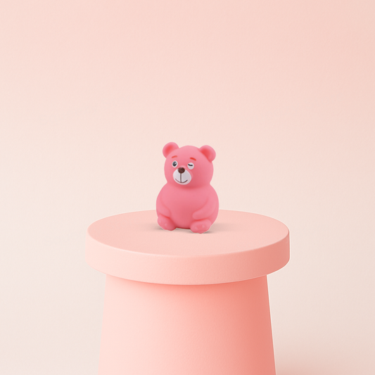 EVA Gentle Bear displayed on a pastel stand, soft bear sensory toy for stress relief.