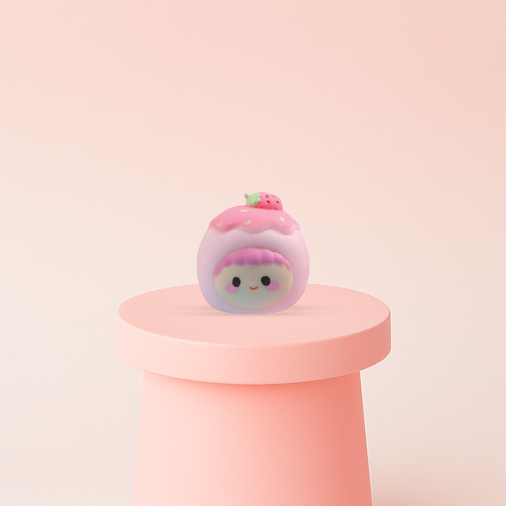 EVA Strawberry Dessert soft sensory toy with pink frosting design, cute face, and strawberry topping.