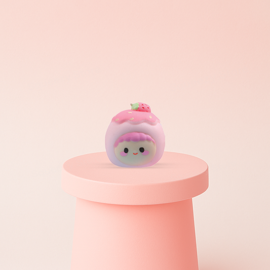 EVA Strawberry Dessert soft sensory toy with pink frosting design, cute face, and strawberry topping.