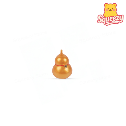 EVA Calabash soft EVA stress relief toy shaped like a metallic gold lucky gourd.