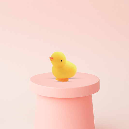EVA Cute Chick soft sensory toy with yellow body, orange beak, and orange feet.