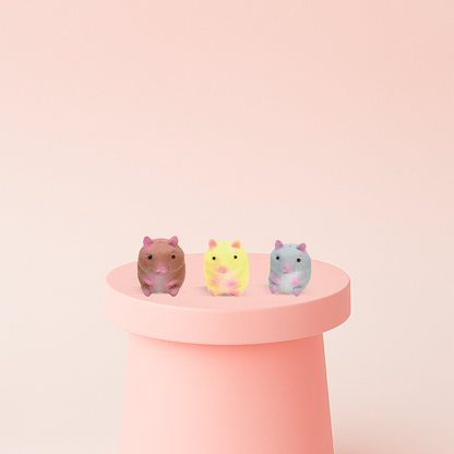 EVA Hamster soft EVA stress relief toy in brown, yellow, and gray hamster designs.