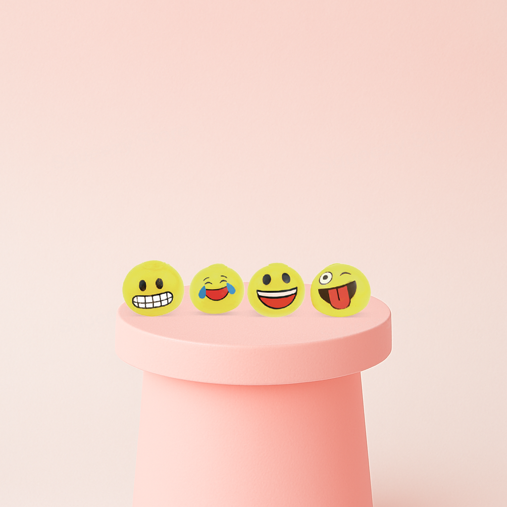 Emoji Splat Ball stress relief toys featuring yellow squeeze balls with laughing, smiling, grinning, and tongue-out emoji faces.
