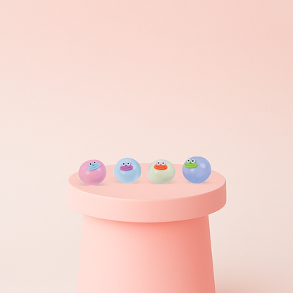 Eva Naughty Ball stress relief toys in pastel pink, blue, white, and green colors with funny smiling faces.