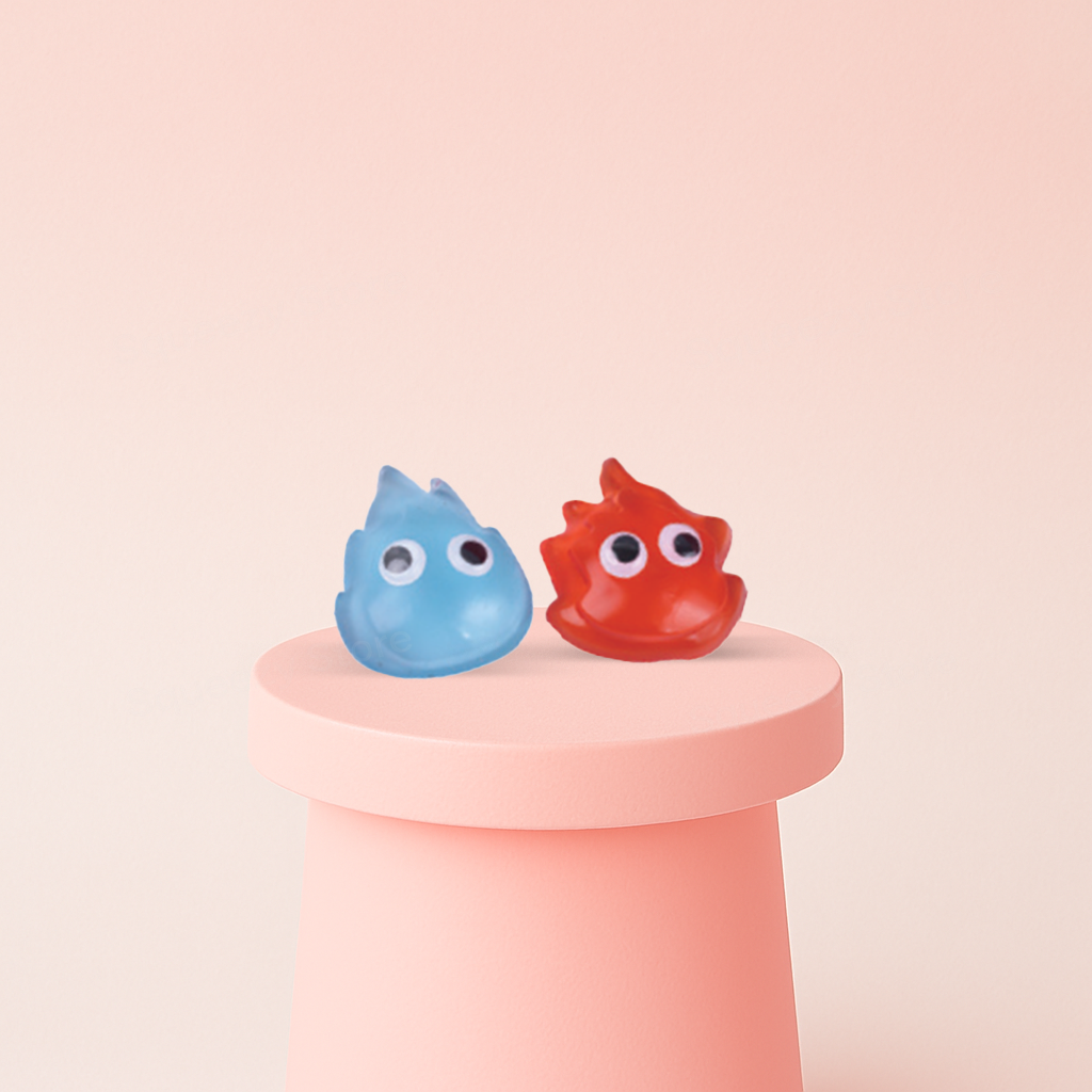 Flame-Shaped Squishies in red and blue droplet-shaped character designs with googly eyes.