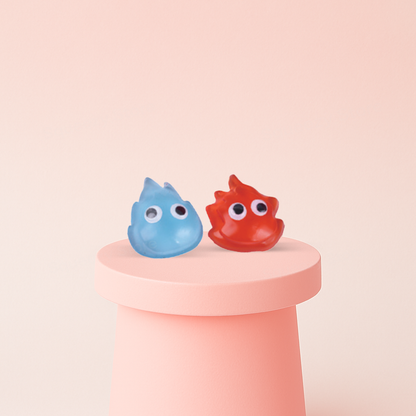 Flame-Shaped Squishies in red and blue droplet-shaped character designs with googly eyes.