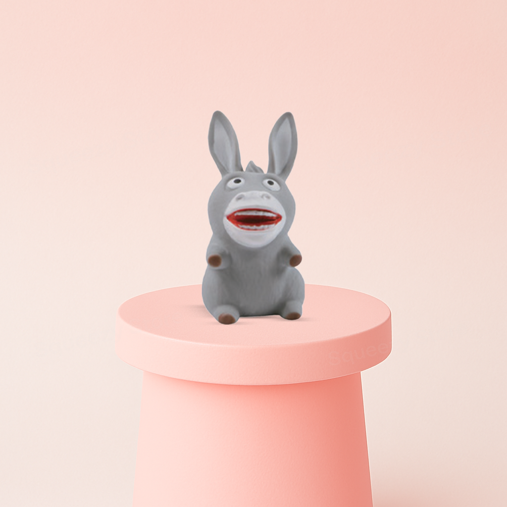 Funny Donkey Squishy displayed on a pastel stand, soft slow-rising sensory toy for stress relief.
