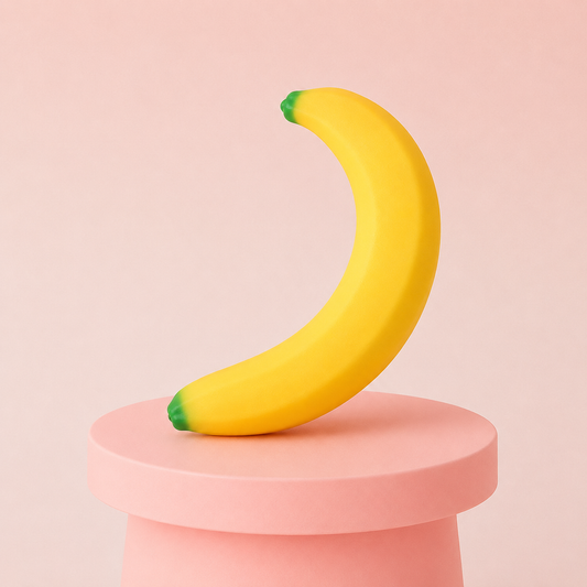 Giant Banana Squishy oversized yellow banana stress relief toy with realistic green tips.