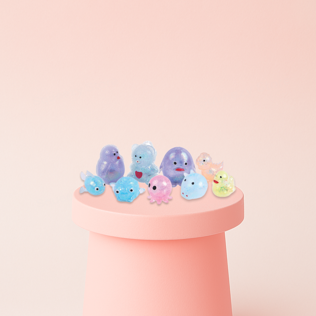 Glitter Animals collection featuring colorful glitter-filled fish, octopus, birds, and other cute animal shapes.