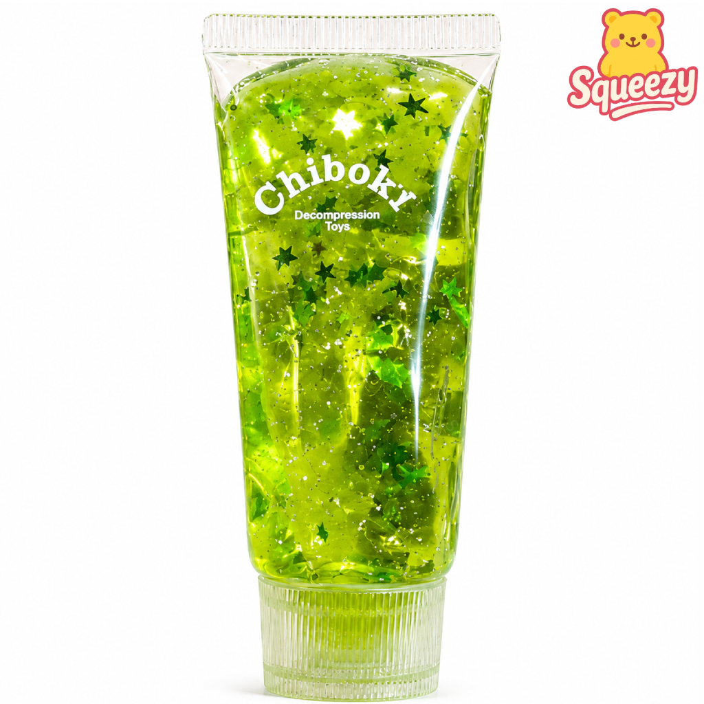 Green Chiboki sensory gel tube filled with glitter stars and sparkling transparent slime texture.
