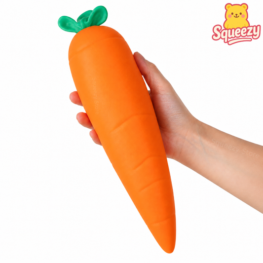 Hand holding the Giant Carrot Squishy to show its oversized realistic carrot design.