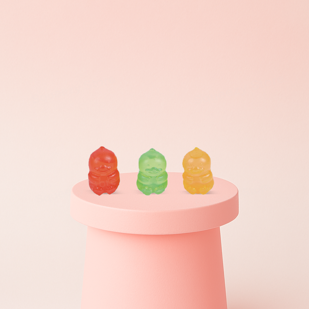 Jelly Duck with Maltose glitter duck stress relief toys in red, green, and yellow colors.