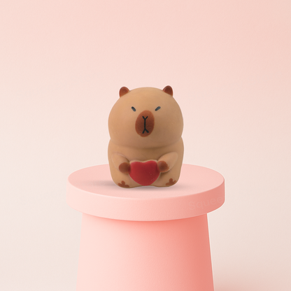 Jumbo Capybara with Heart super soft slow-rising stress relief toy holding a red heart.