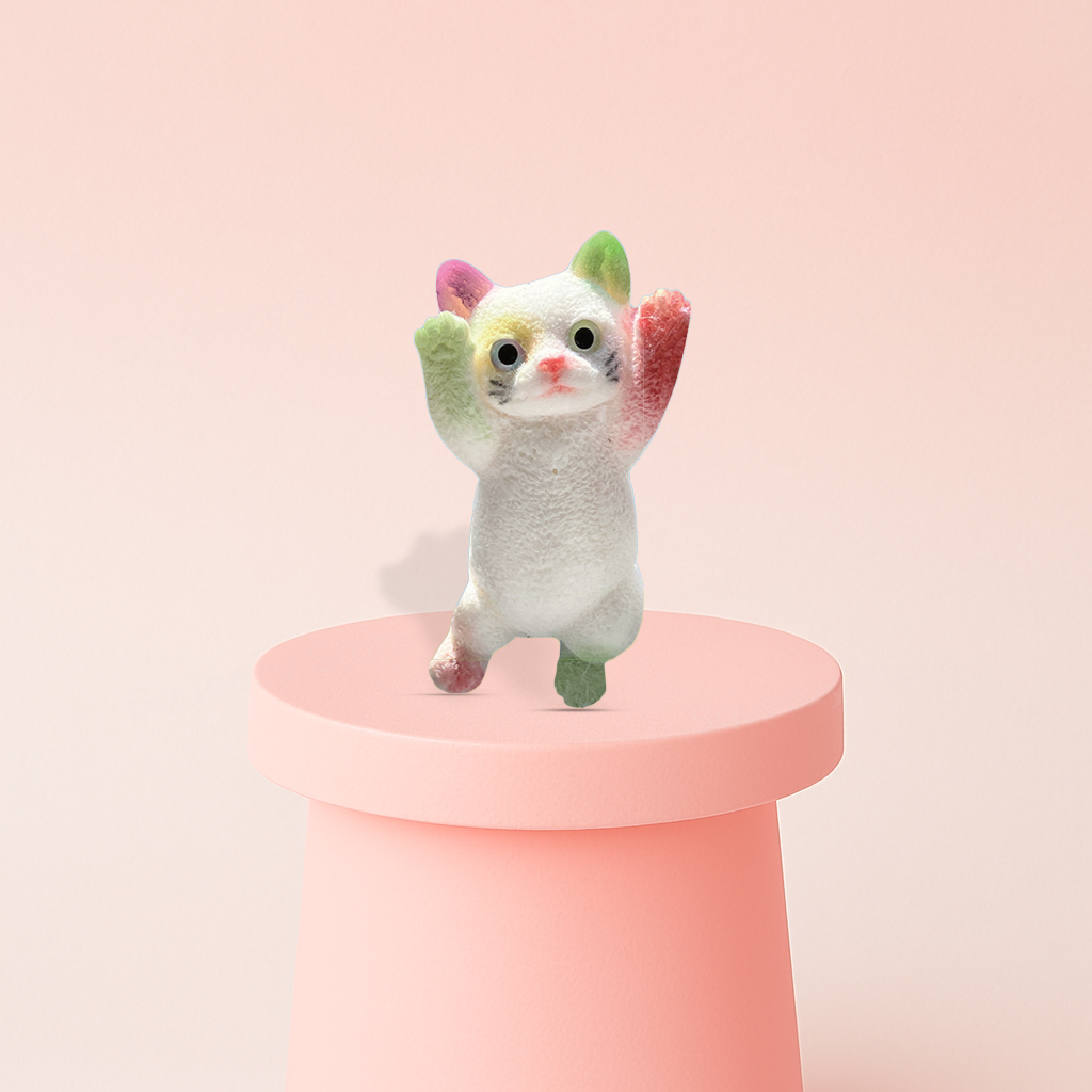 Jumbo Hand-Up Cat Squishy displayed on a pastel stand, ultra-soft slow-rising sensory toy for stress relief.