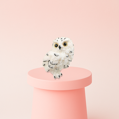Jumbo Owl Squishy displayed on a pastel stand, ultra-soft slow-rising sensory toy for stress relief.