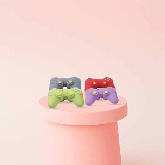 Jumbo Size EVA Gamepad soft game controller stress relief toy available in gray, red, purple, and green.