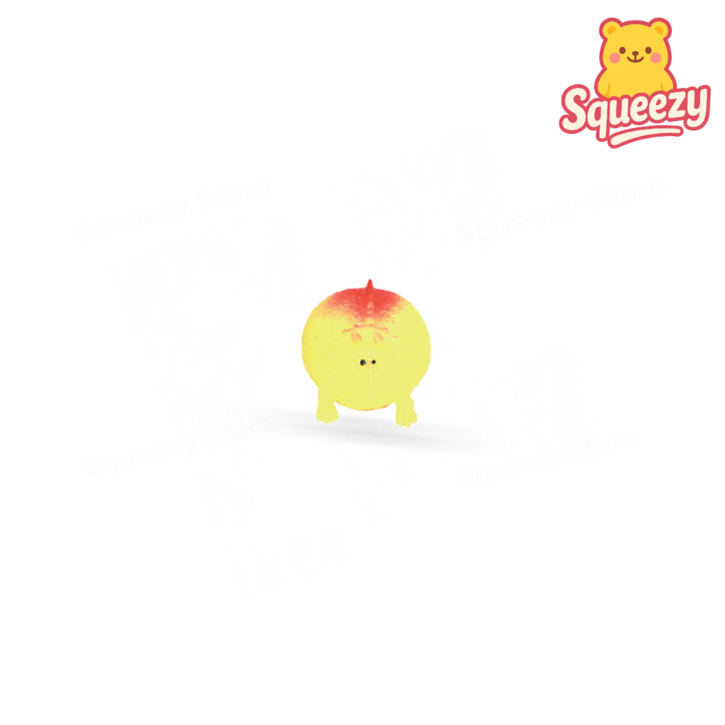 Yellow Little Dinosaur soft stress relief toy with tiny spikes and smiling face.