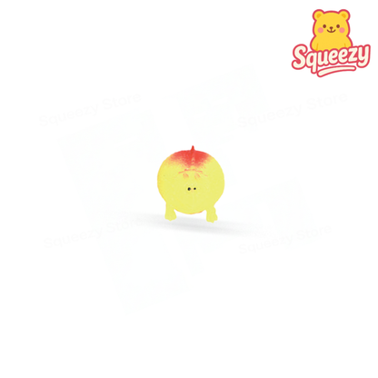 Yellow Little Dinosaur soft stress relief toy with tiny spikes and smiling face.