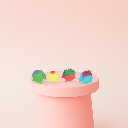 Little Dinosaur soft EVA stress relief toy in yellow, red, green, and blue dinosaur designs.