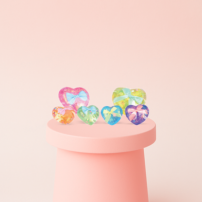 Little Maltose Heart collection featuring faceted heart-shaped squishies filled with sparkling glitter.