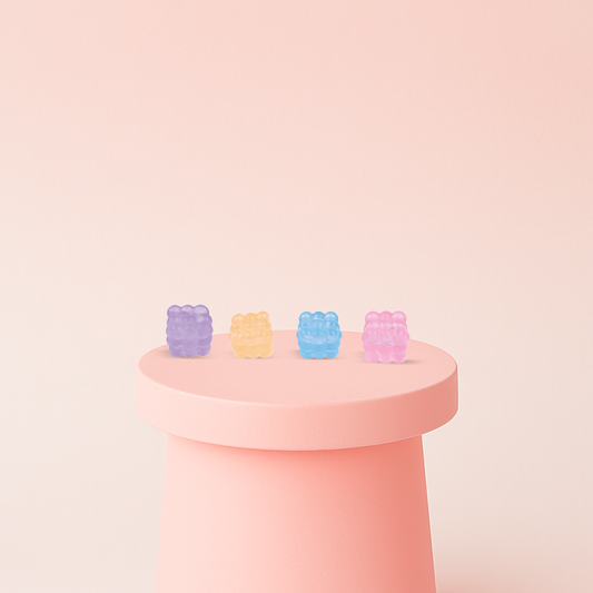 Marshmallow Maltose Cube collection featuring pastel cube-shaped squishies filled with sparkling glitter.