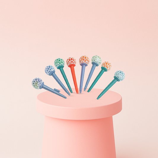Mesh Ball Pen collection featuring blue, orange, purple, and teal pens with colorful mesh ball toppers.