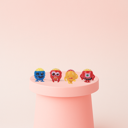 Monster Mesh Ball soft EVA stress relief toy in red, blue, and yellow monster designs.