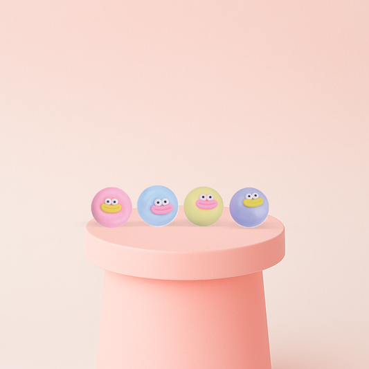 Naughty Face Super Ball stress relief toys in blue, yellow, pink, and purple colors with funny cartoon faces.