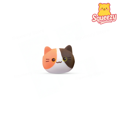 Orange  Super Squishy Cat round cat-shaped slow-rising stress relief toy in assorted colors.