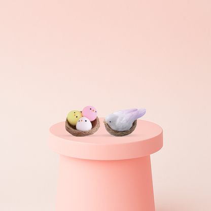 Pet Squishies with Nest collection featuring yellow, pink, and white egg characters and a white bird in a nest.