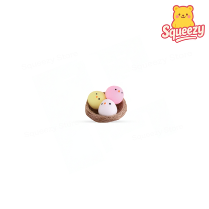 Pet Squishies with Nest display box featuring mini animal and egg-shaped EVA stress relief toys with decorative nests.