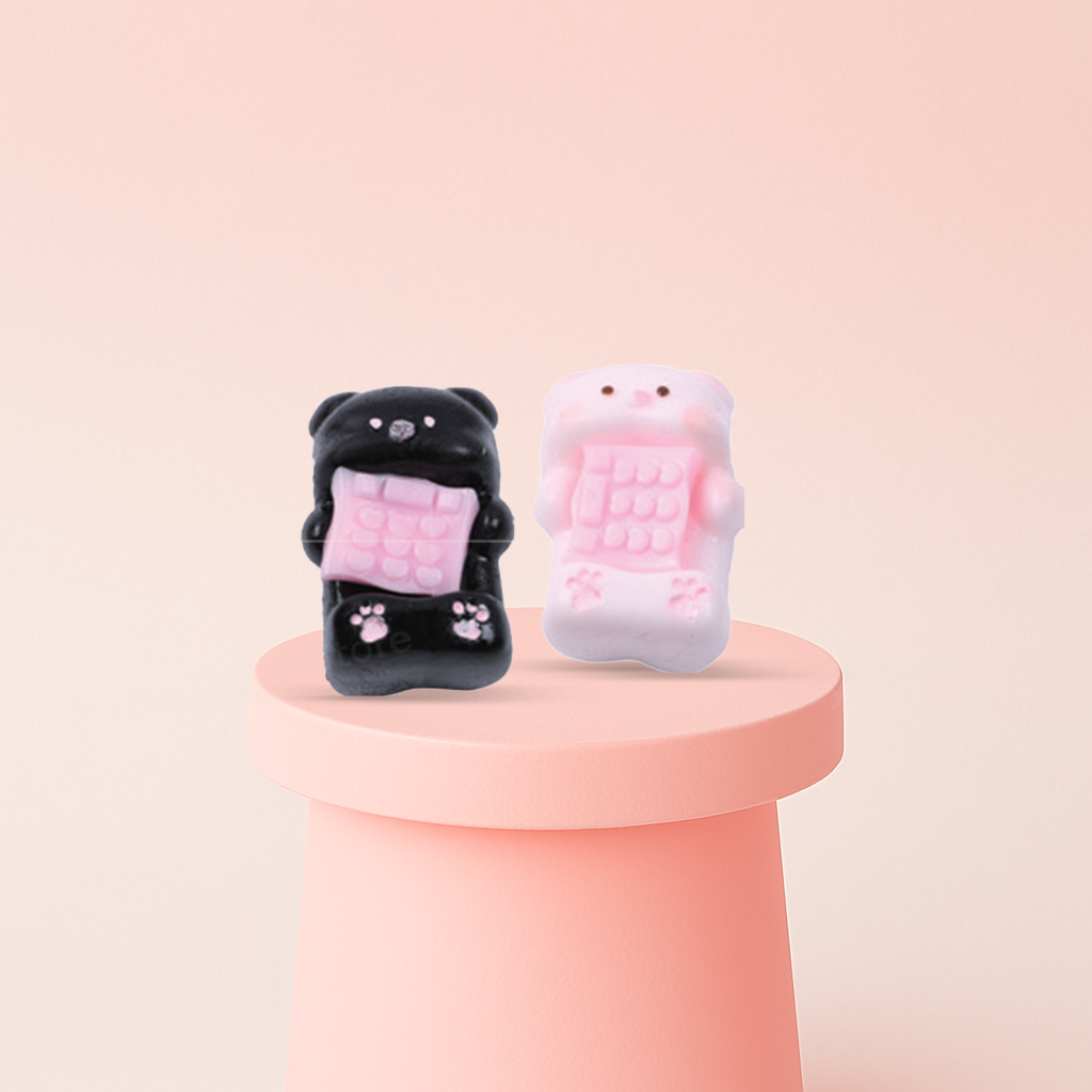 Piggy Phone Squishies in black and pink colors, super soft slow-rising stress relief toys.