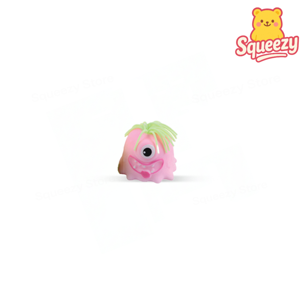 Pink EVA Monster soft one-eyed stress relief toy with rainbow hair.