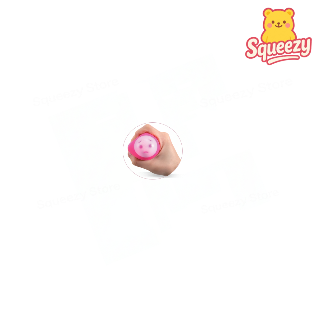 Pink Squishy Emoji Face Ball squeezable stress relief toy revealing a cute cartoon face.