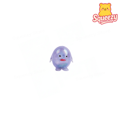 Purple Glitter Animal glitter-filled toy shaped like a round bird.