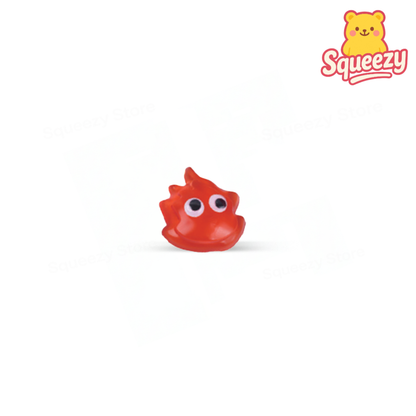 Red Flame-Shaped Squishy sensory toy with flame-like shape and funny cartoon eyes.