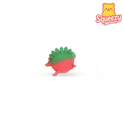 Red Little Dinosaur soft sensory toy with green spikes and round body.