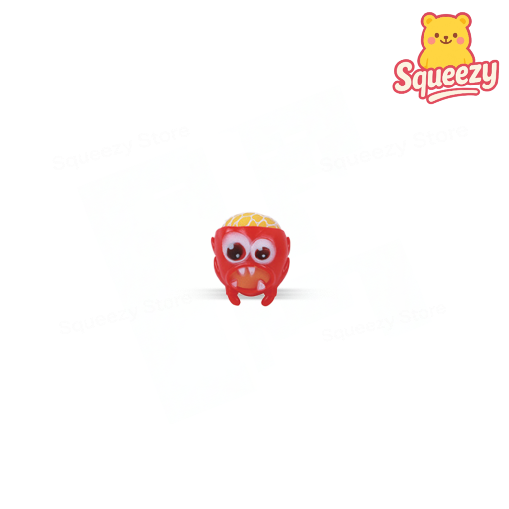 Red Monster Mesh Ball soft EVA stress relief toy with large goggles and playful expression.