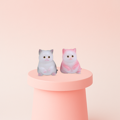 Small Cat Squishies in white and pink colors, super soft slow-rising stress relief toys.