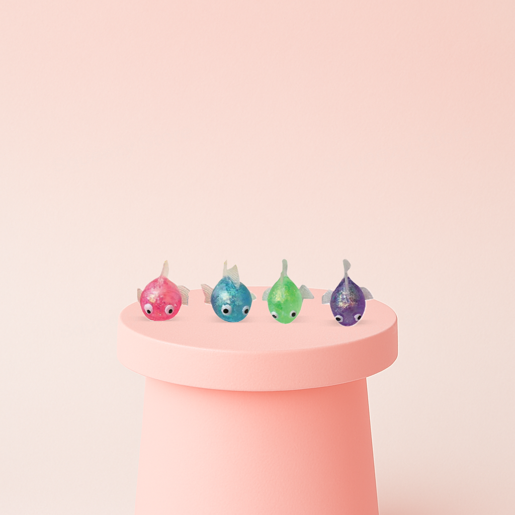 Small Fish with Maltose soft EVA stress relief toys in pink, blue, green, and purple fish designs.