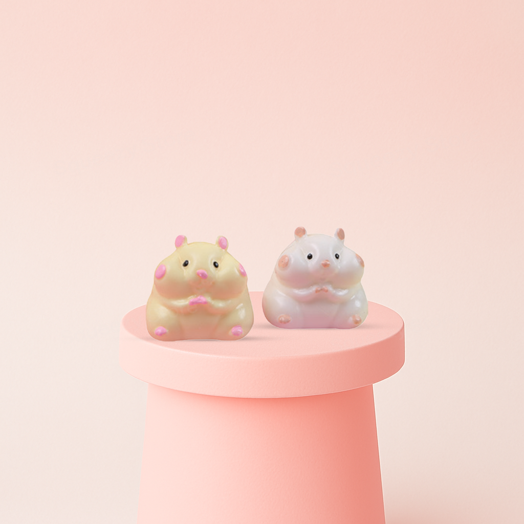 Small Squishy Hamster displayed on a pastel stand, soft slow-rising hamster sensory toy for stress relief.