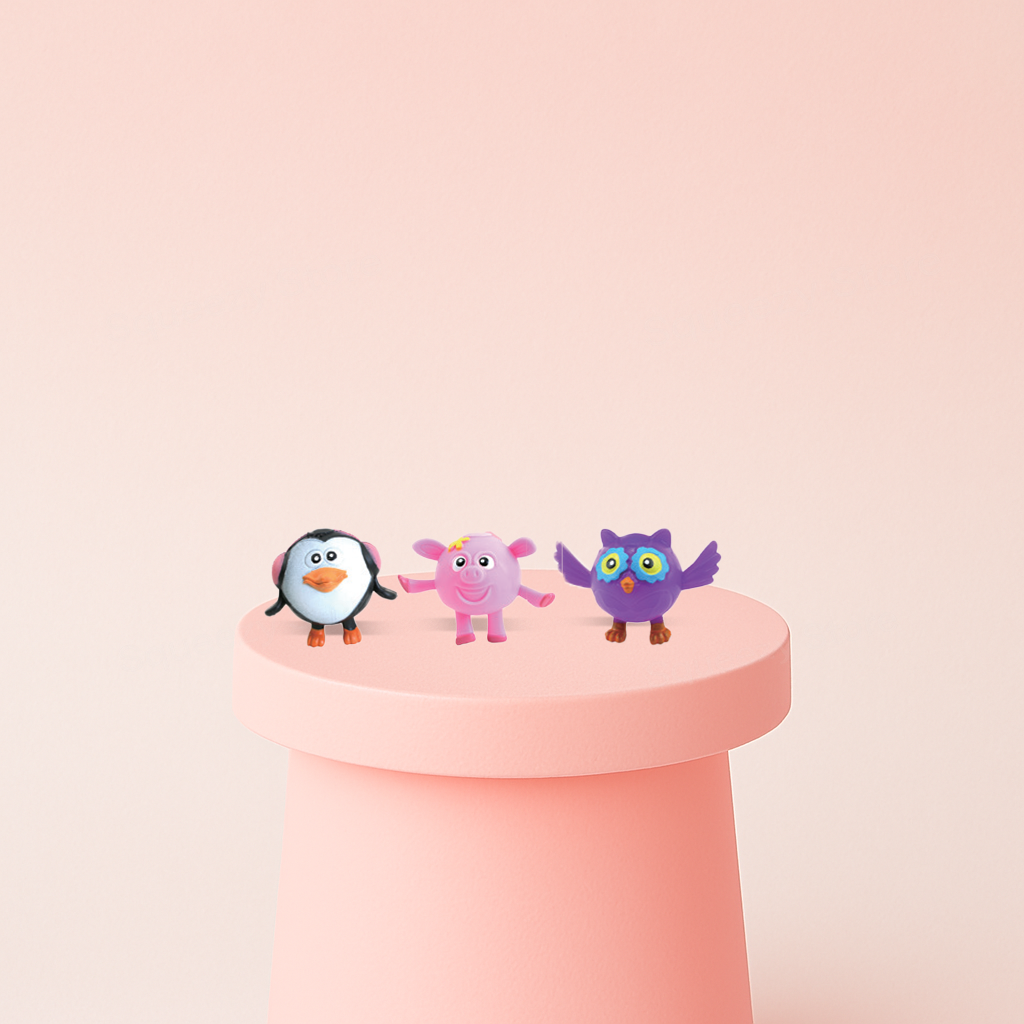Squishy Animal collection featuring a penguin, pig, and owl in colorful cartoon designs.